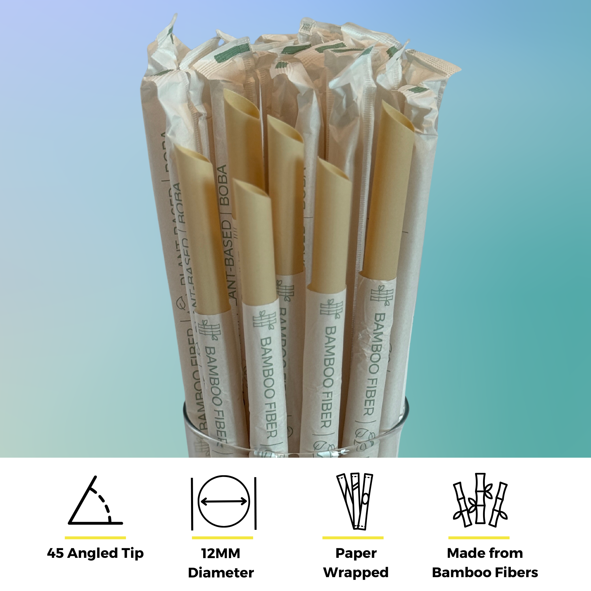 Glass of individually paper-wrapped Holy City bamboo fiber boba straws with 12mm diameter and 45° angled tips, highlighting compostable, plant-based design.