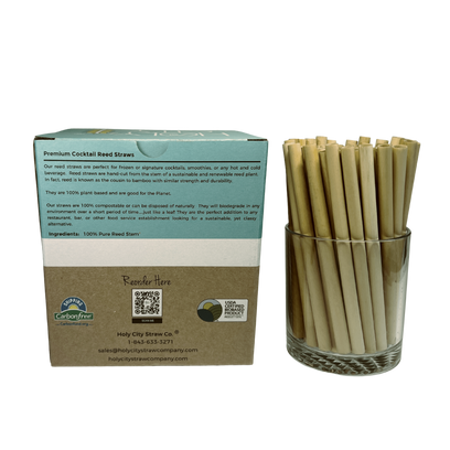 250 count box ofHoly City Straw Company cocktail reed straws next to a cup of straws back
