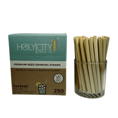250 count box ofHoly City Straw Company cocktail reed straws next to a cup of straws front