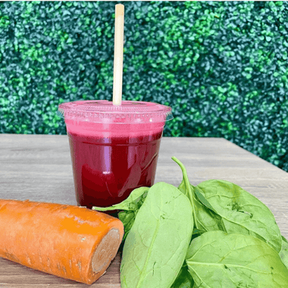 Beet infused juice with raw vegetables